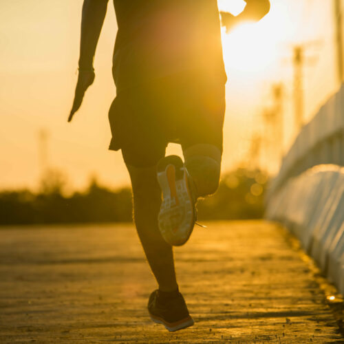 silhouette-young-fitness-man-running-sunrise